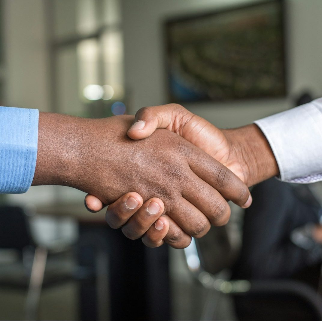 two people shaking hands